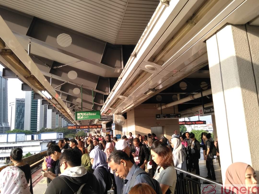 A crowded train platform at the Pasar Seni LRT station in Kuala Lumpur, Malaysia.